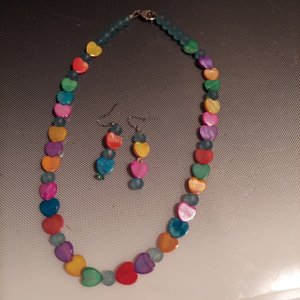 Luscious mother of pearl heart necklace matching earrings